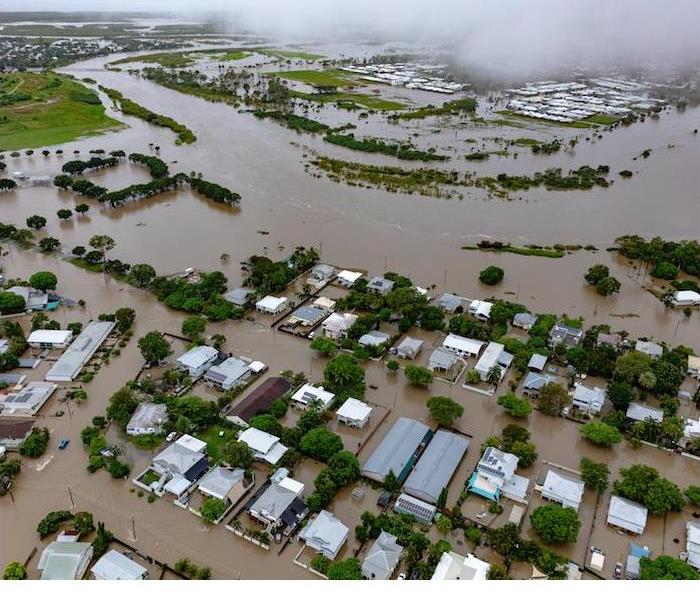 A town struggles with severe flooding after a major storm.