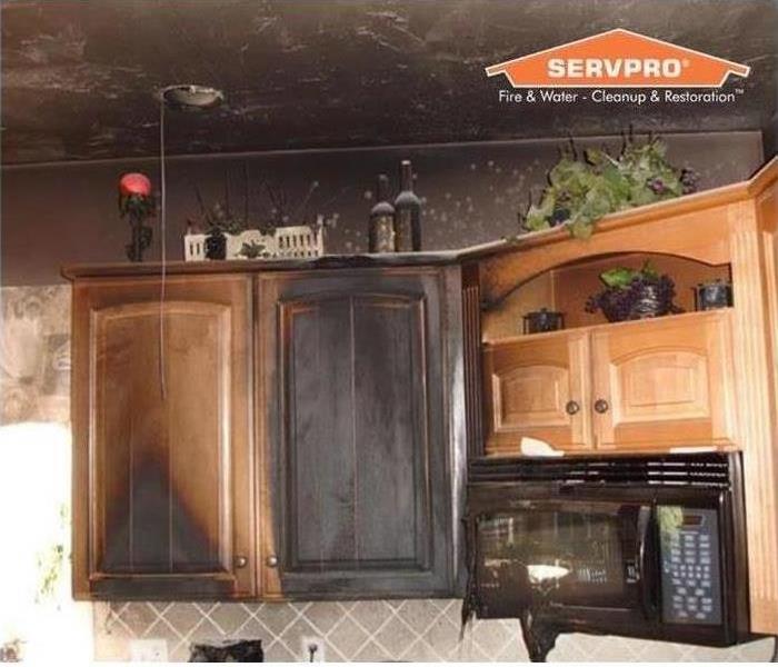 Fire Precautions During this Holiday Season - image of smoke-damaged kitchen
